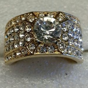 Gold plate 14K, white sapphire center stone.